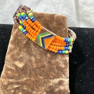 Santa Fe Style Beads W/Tribal Squares And Multi Color Beads On A Stretchy Cord.